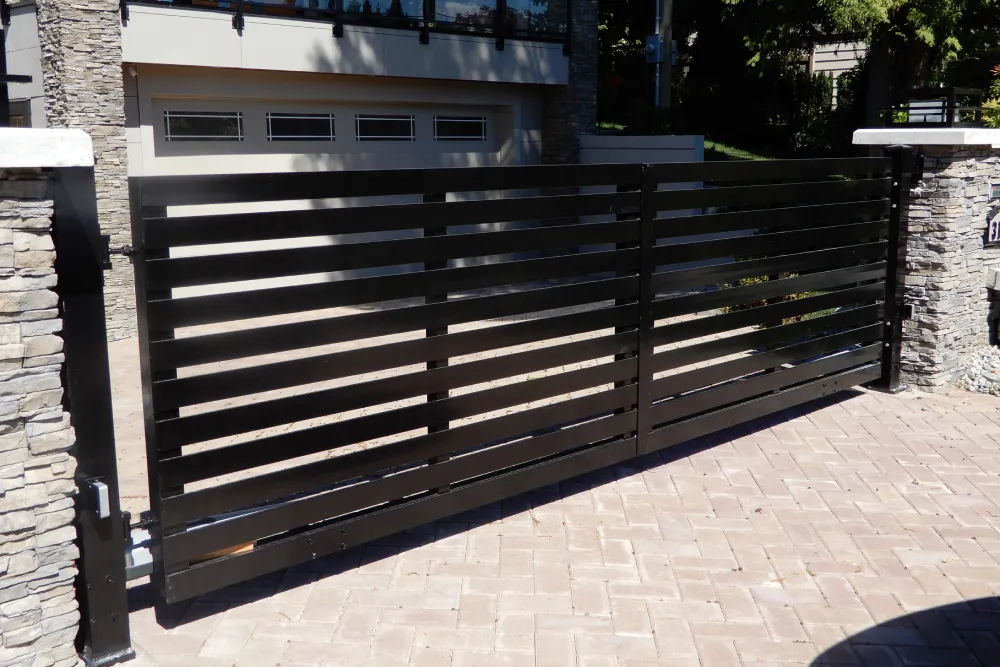 Automatic sliding gates with manual sliding gates
